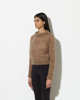 Model from the side wearing womens mohair pullover in Caramel Melange.