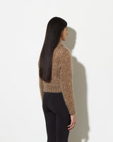 Model from the back wearing womens mohair pullover in Caramel Melange.