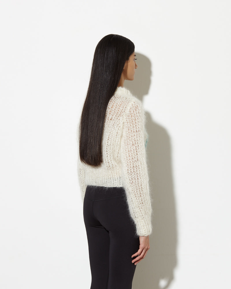 model from the back wearing Womens mohair pullover. New style. Hand-made with love.